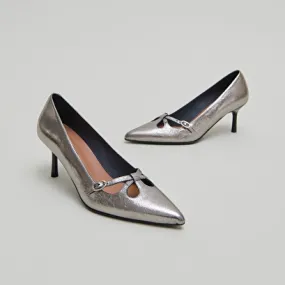 Cross-strap pumps in dark metallic leather