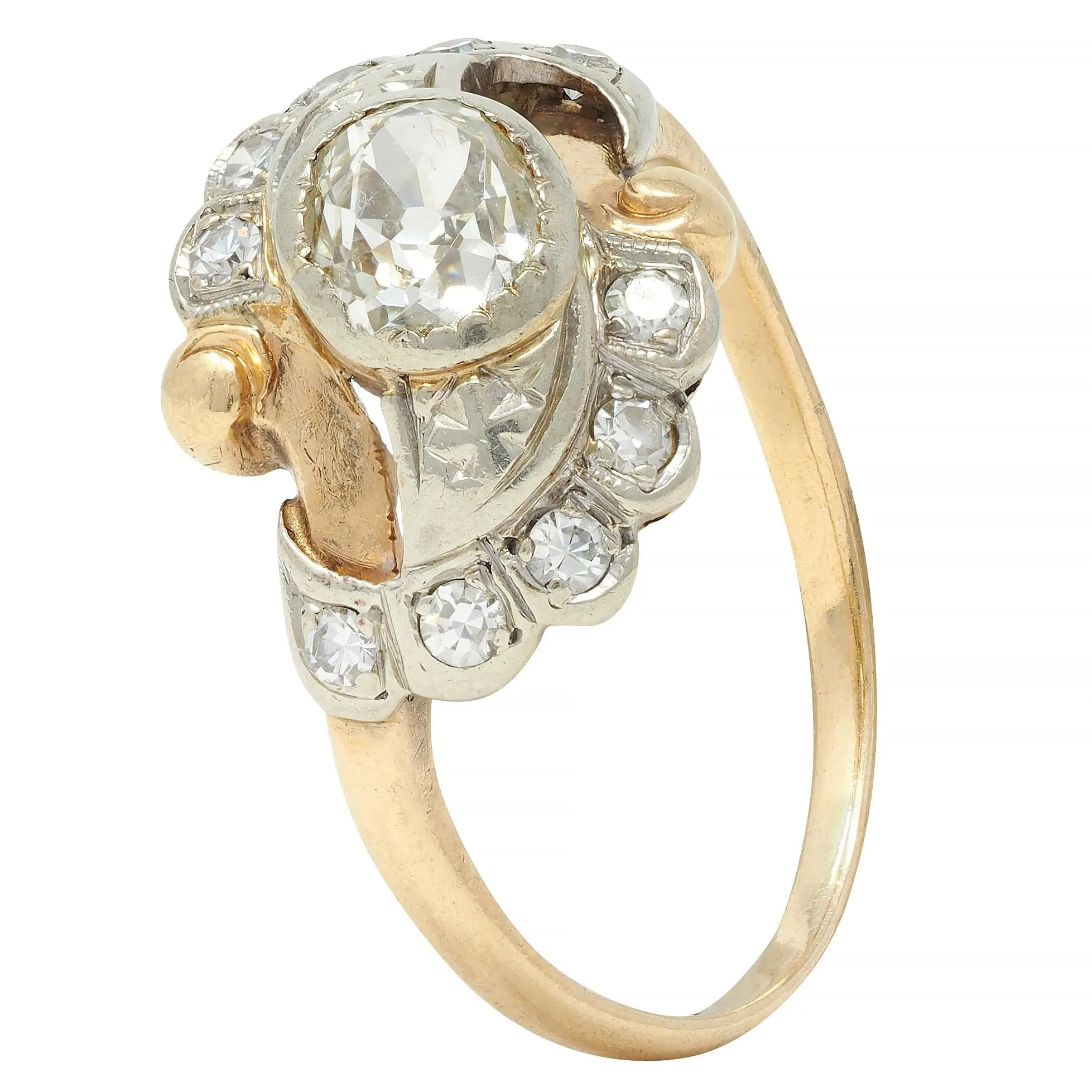 Early Art Deco 0.75 CTW Old Mine Cut Diamond 14 Karat Two-Tone Gold Vintage Bypass Ring