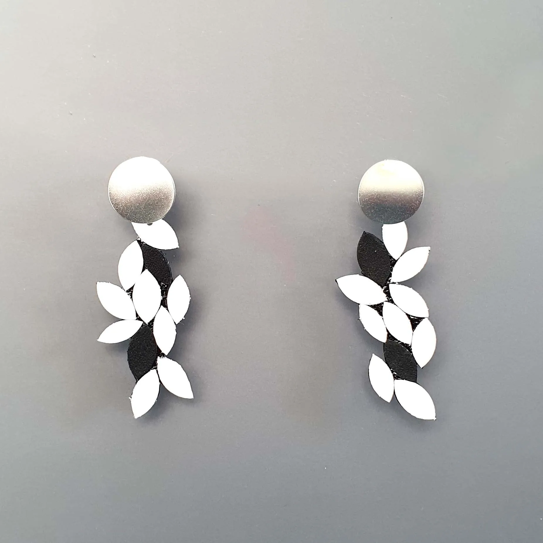 Leaf white dangle leather earrings