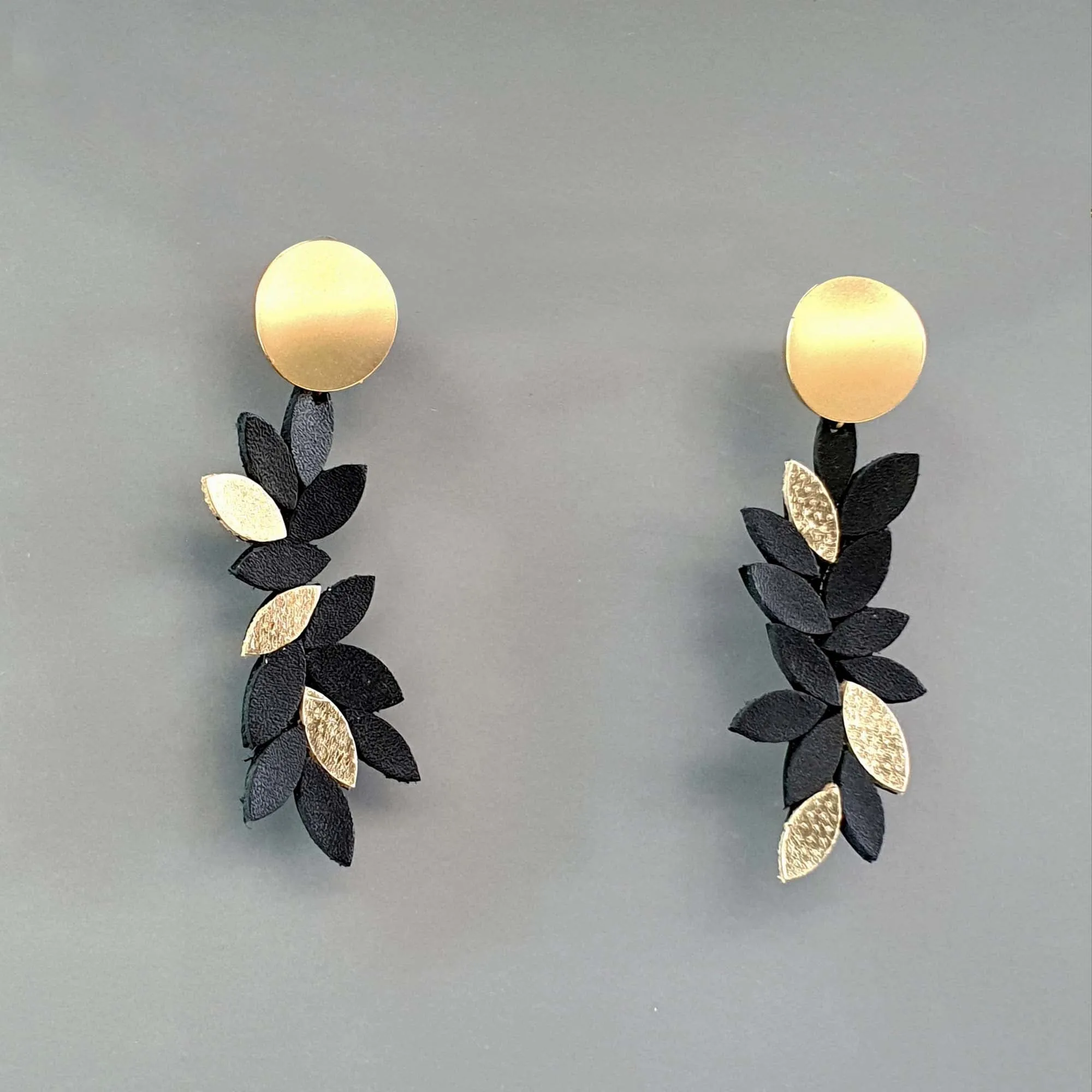 Leaf white dangle leather earrings