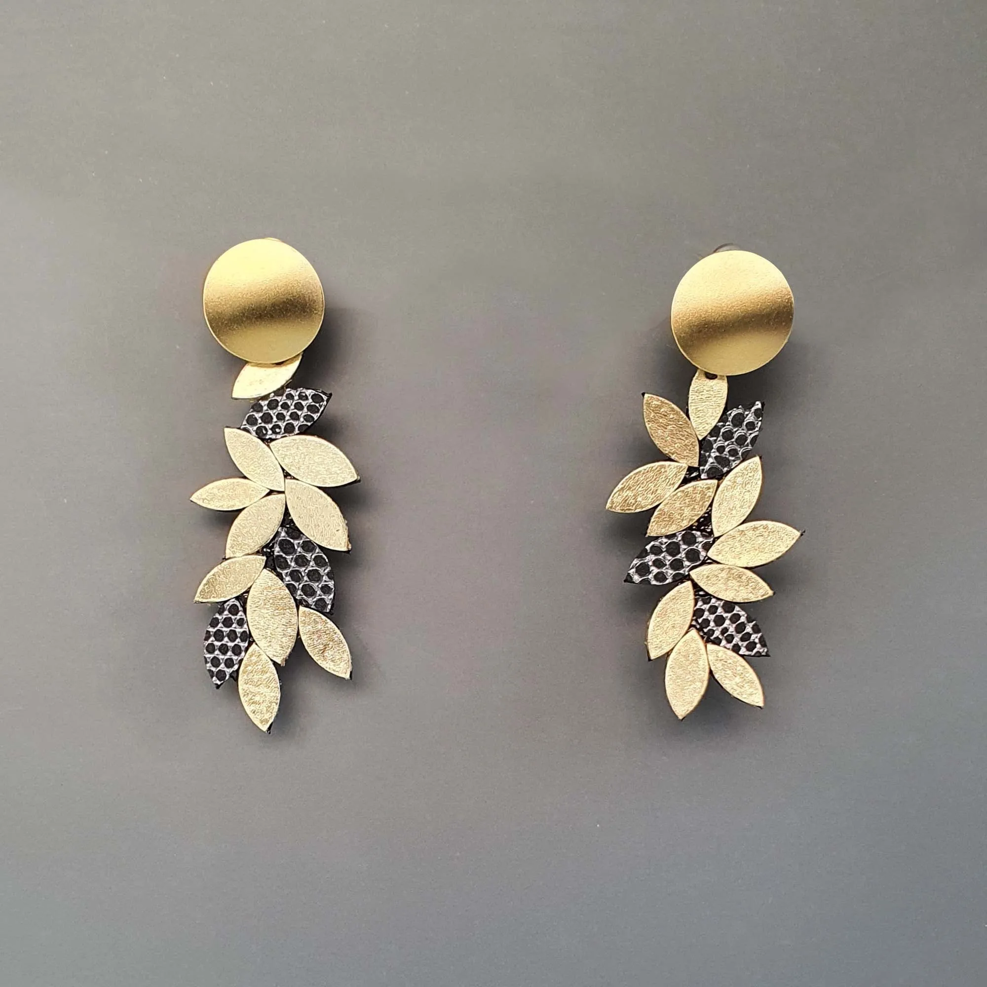 Leaf white dangle leather earrings