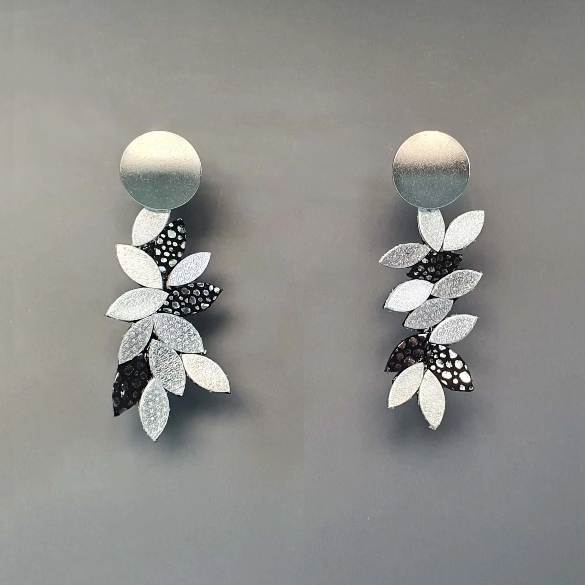 Leaf white dangle leather earrings